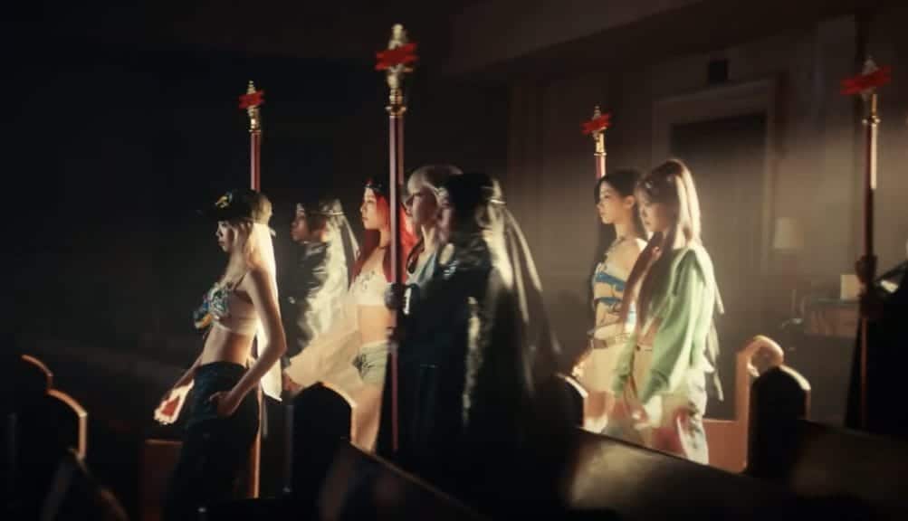 Crosses in the MV replaced with the group's logo (Credit: HYBE LABELS)